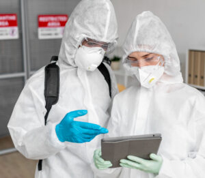 people-wearing-protective-equipment-disinfecting-dangerous-area